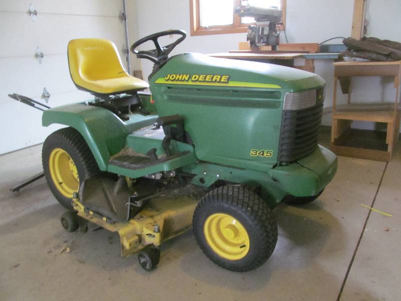lot 14 image: John Deere 345 riding lawn mower