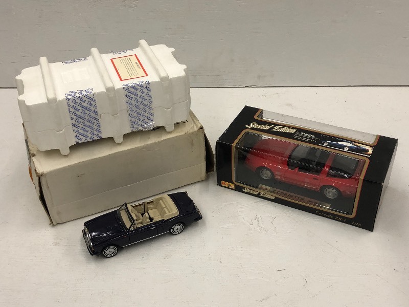 lot 39 image: (2) 118-Scale Die-Cast Collectible...