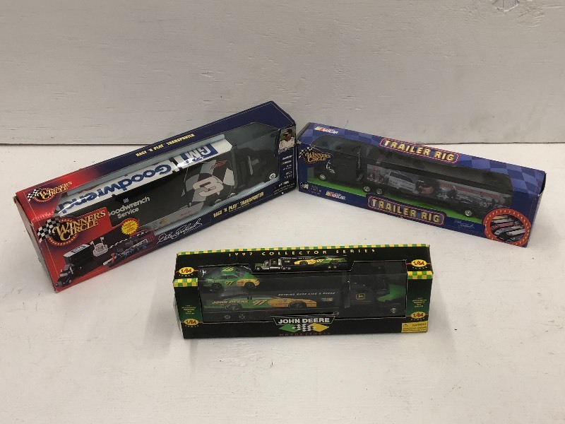 lot 54 image: (3) 164-Scale Collectible Semi Tru...