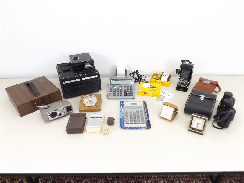 Large Lot of Vintage Cameras, Clocks, Calculators, etc.&nbsp