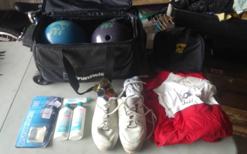 lot 17 image: Bowling Related, Balls, Bag, Shoe Brushes, Cleaners, Bowling Shirt