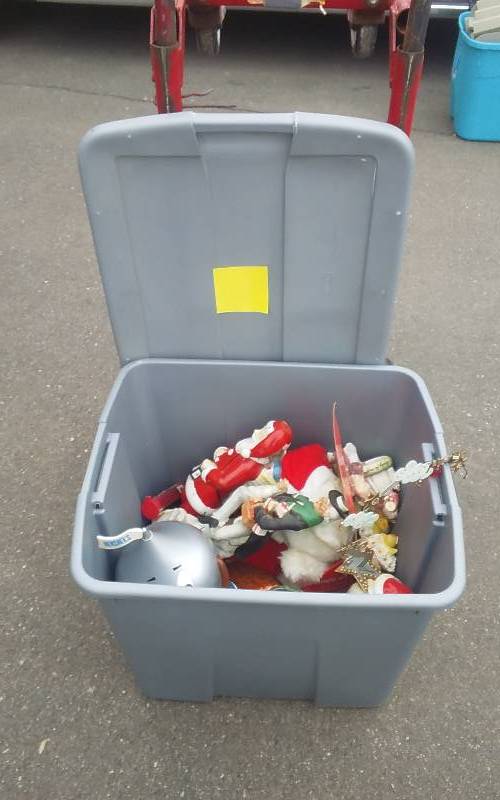 lot 30 image: Tote With Lid Full Of Seasonal Decor-Christmas, Halloween, Easter
