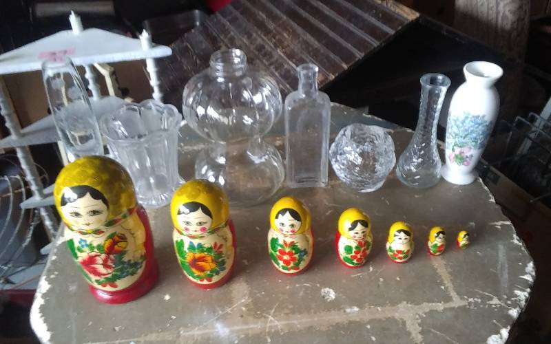 lot 49 image: Collectibles- Nesting Dolls, Old Bottle, Vases, Candle Holder, Misc.