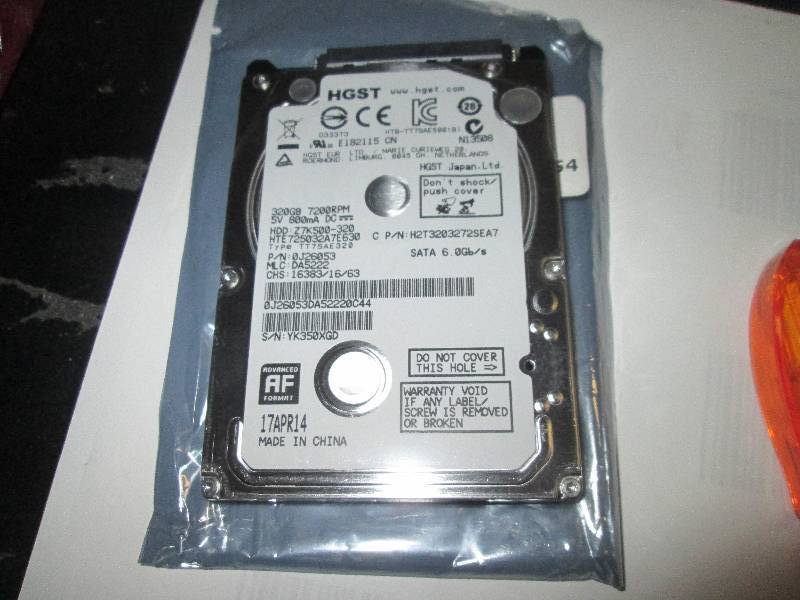 lot 40 image: 320GB HGST hard drive...