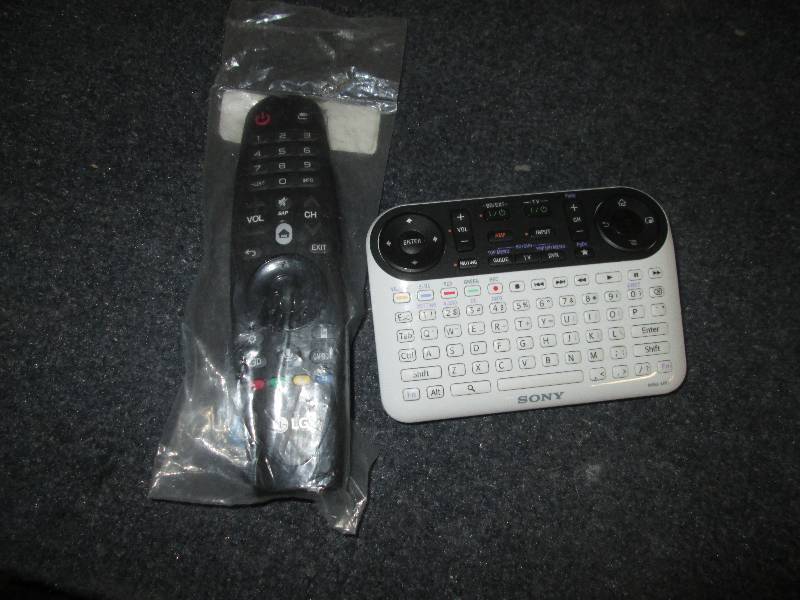 lot 63 image: lot of 2 universal remotes lg and s...