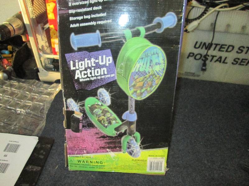 lot 72 image: kids ninja tutle 3 wheel scooter...