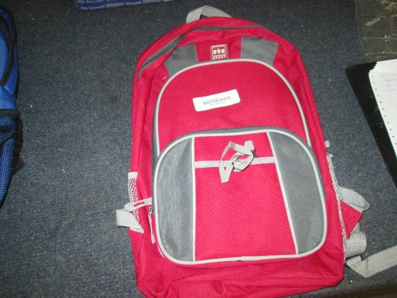 lot 82 image: red allpupose backpack...