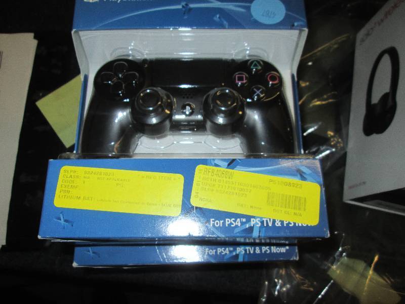 lot 103 image: PS4 controller...