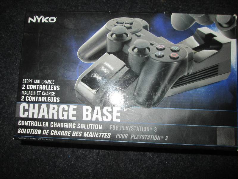 lot 119 image: nykon playstation controller chargi...