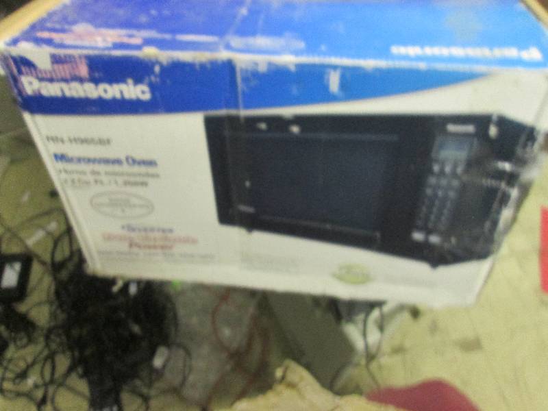 lot 126 image: panasonic 22cf microwae powers on...