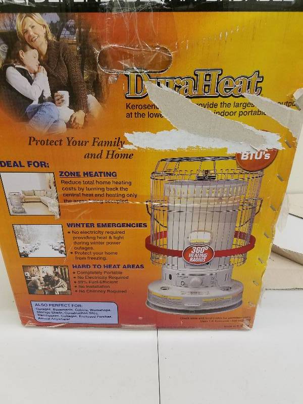 lot 128 image: Kerosene portable heater