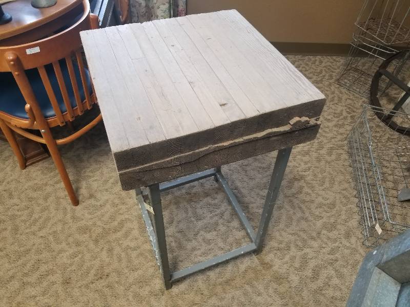 Wood block table with base.