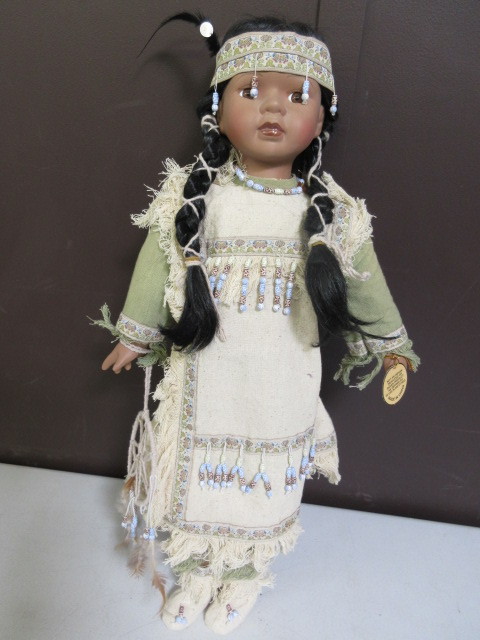 lot 527 image: NATIVE AMERICAN DOLL