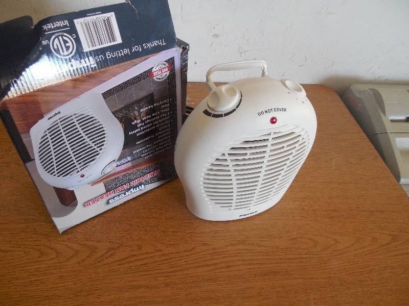 lot 138 image: ELECTRIC HEATER FAN