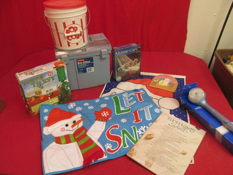 lot 164 image: shower brush, popcorn set, file box, planter,doormat,puzzle