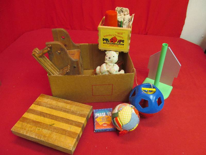 lot 211 image: cutting board, toy, card game