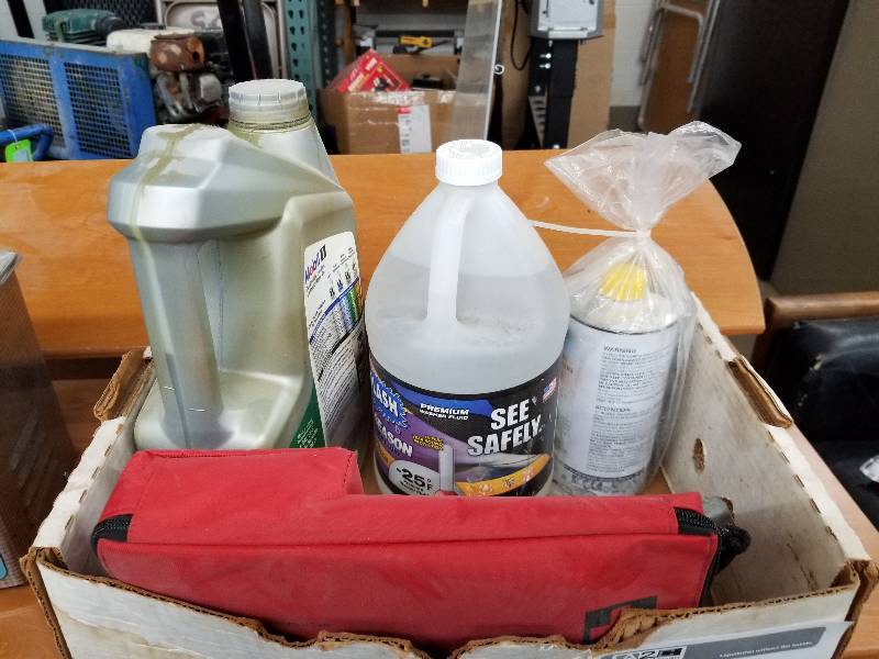 lot 88 image: Brake Fluid, Mobil1 Oil, Windshield Fluid, Tire Irons