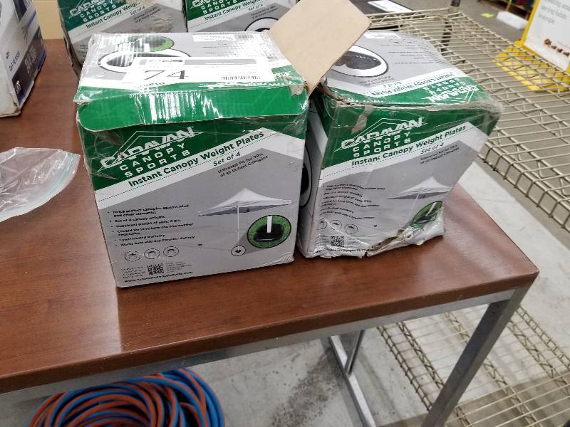 lot 74 image: Lot of (2) Caravan Canopy Sports Instant Canopy Weight Plates