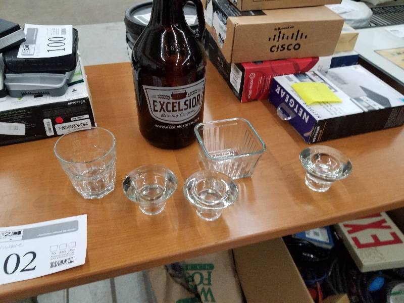 lot 102 image: Lot of (6) Glassware - Candle Holders, Bar Glass, Candy Bowl, Excelsior Brown Bottle
