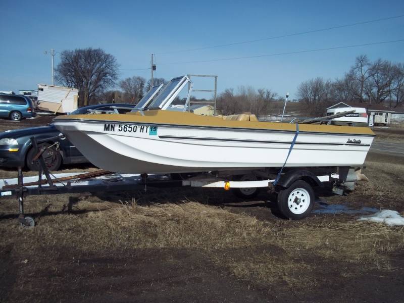 lot 4 image: Sea Sprite Boat and Trailer and 50 HP Johnson Outboard Motor