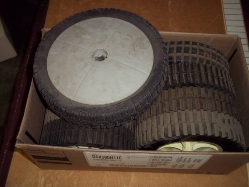 lot 22 image: Lawn Mower wheels