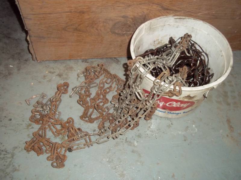 lot 24 image: Lawn mower tire chains
