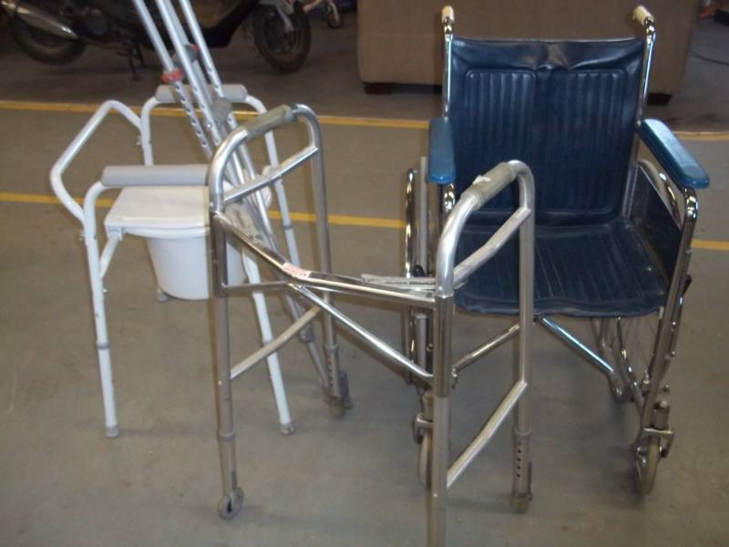 lot 41 image: Wheel Chair, Walker, Potty chair and crutches