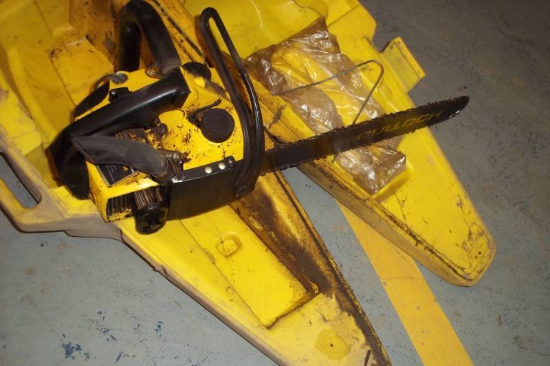 lot 92 image: Mcculloch Chain Saw with case