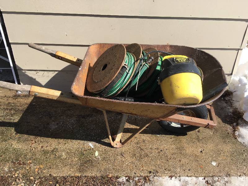 lot 153 image: Wheelbarrow, Soaker Hoses, and Stanley Shop Vac
