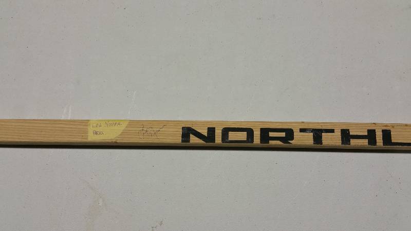 lot 56 image: Lou Nanne Minnesota North Stars Autographed Vintage Northland Hockey Stick