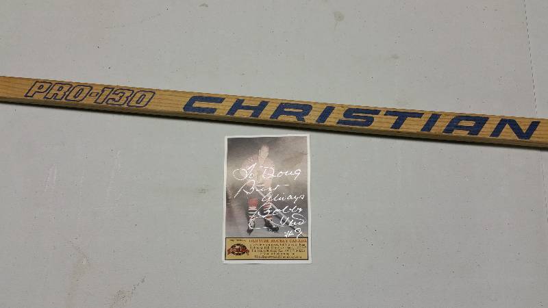 lot 57 image: Bobby Hull Autographed Photo & Vintage Christian Hockey Stick