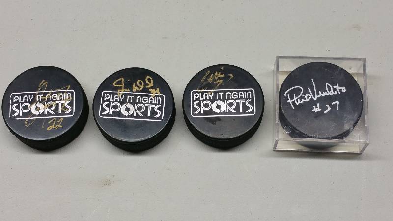 lot 60 image: Minnesota Wild NHL Hockey Autographed Pucks