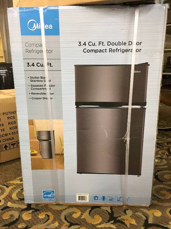 lot 255 image: Midea WHD-125FBS1 Fridge, Retail $99.99