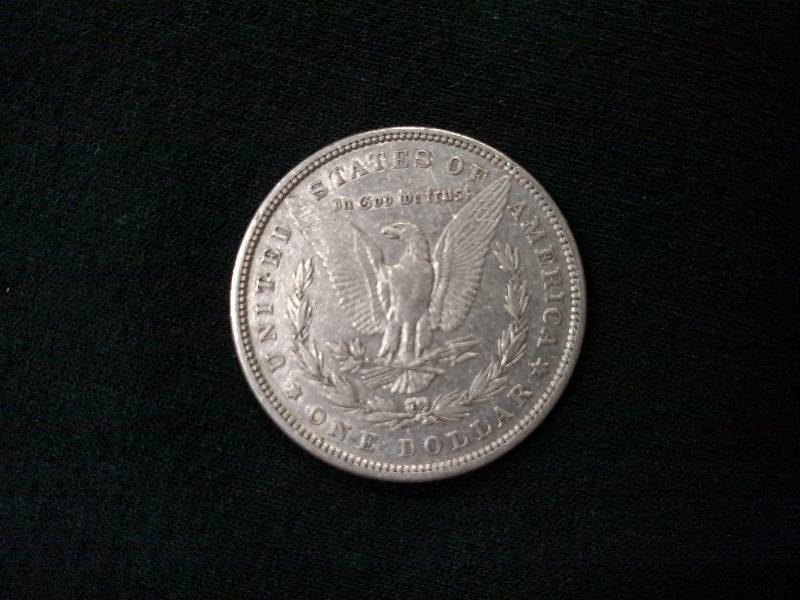 lot 2 image: 1879 Morgan Silver Dollar...