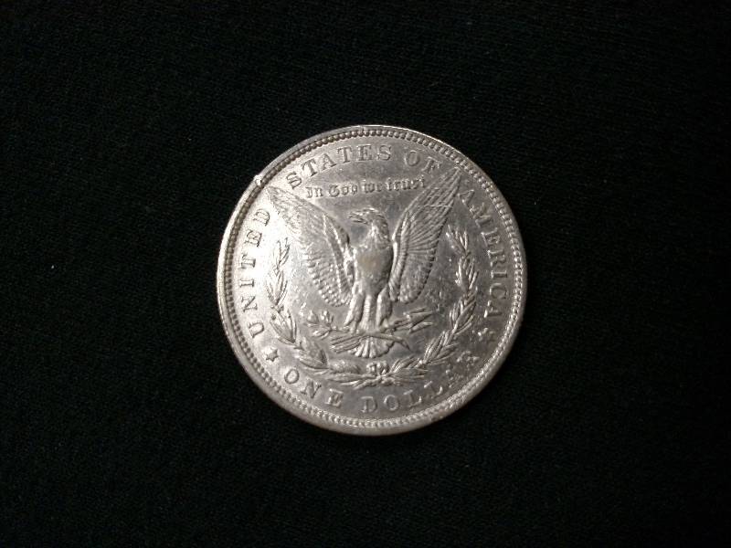 lot 4 image: 1880 Morgan Silver Dollar...