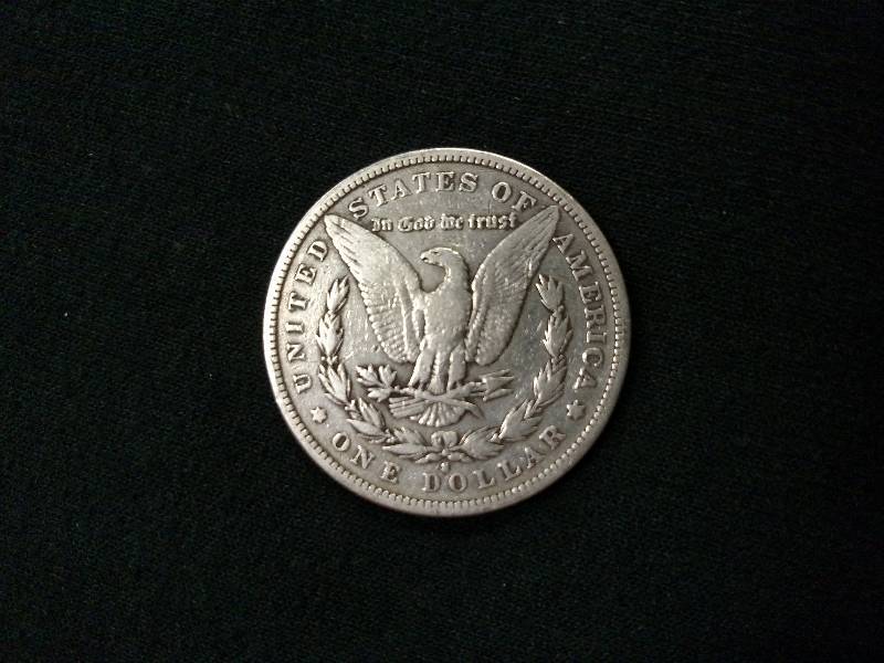 lot 7 image: 1882 S Morgan Silver Dollar...