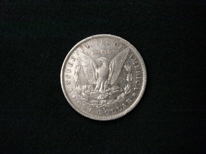 lot 8 image: 1883 O Morgan Silver Dollar...