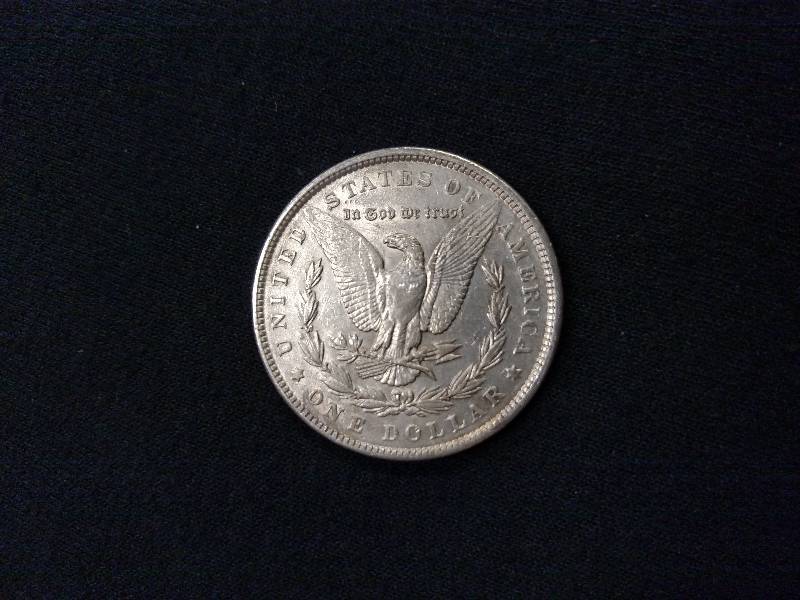 lot 15 image: 1889 Morgan Silver Dollar...
