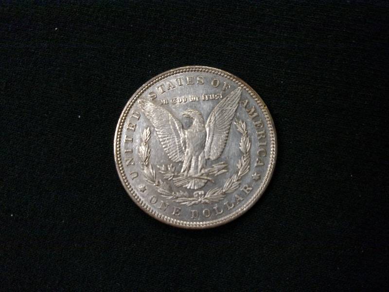 lot 21 image: 1897 Morgan Silver Dollar...