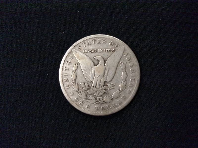 lot 24 image: 1899 S Morgan Silver Dollar...