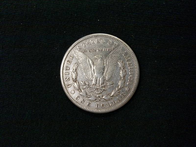 lot 45 image: 1921 S Morgan Silver Dollar...