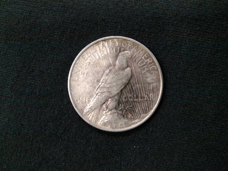 lot 48 image: 1922 Peace Silver Dollar...