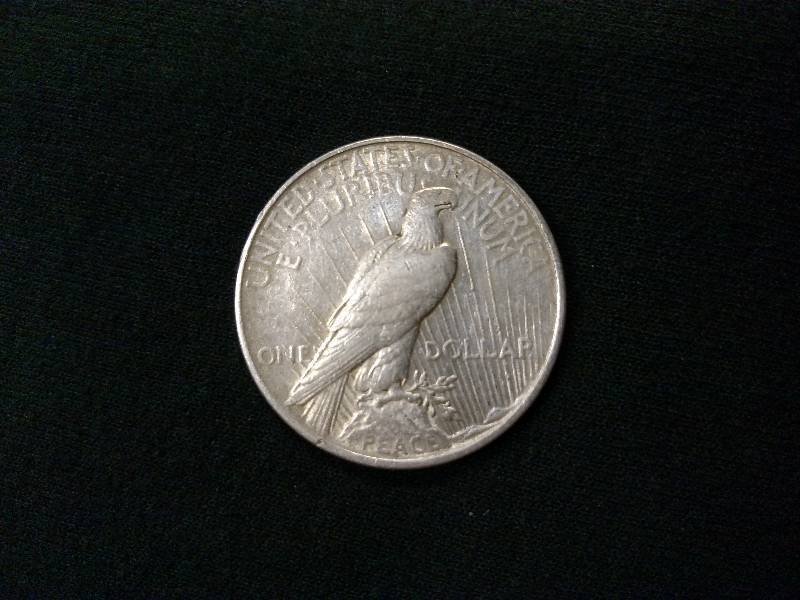 lot 49 image: 1922 Peace Silver Dollar...