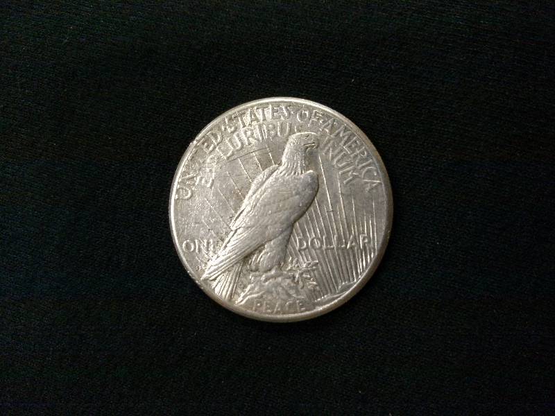 lot 54 image: 1922 S Peace Silver Dollar...