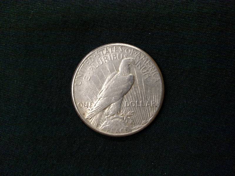 lot 55 image: 1922 S Peace Silver Dollar...