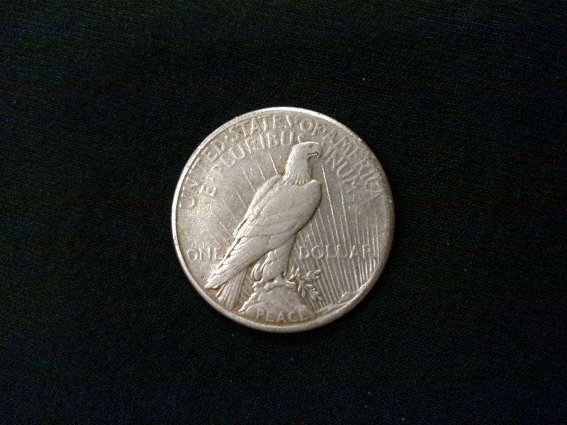 lot 57 image: 1922 S Peace Silver Dollar...
