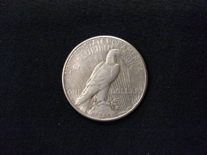 lot 62 image: 1923 S Peace Silver Dollar...