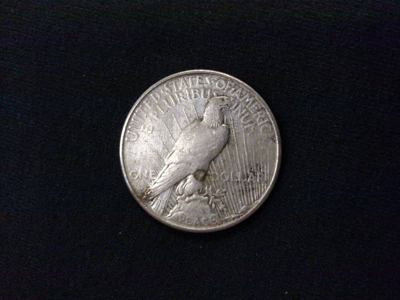 lot 65 image: 1923 S Peace Silver Dollar...