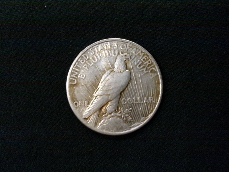 lot 69 image: 1924 Peace Silver Dollar...