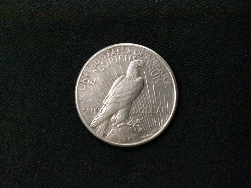 lot 71 image: 1925 Peace Silver Dollar...